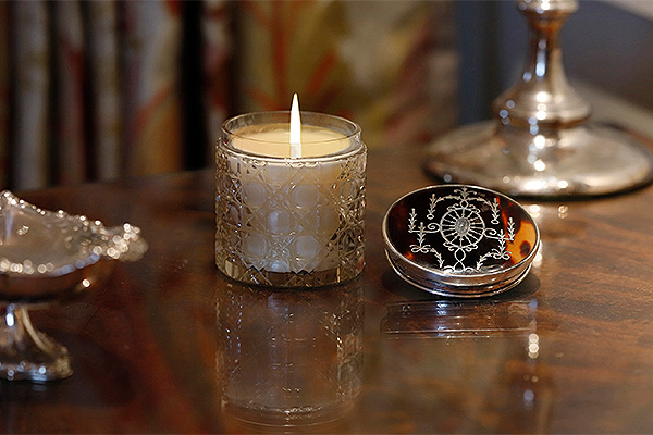 Luxury, bespoke, fraganced candles in antique and contemporary containers